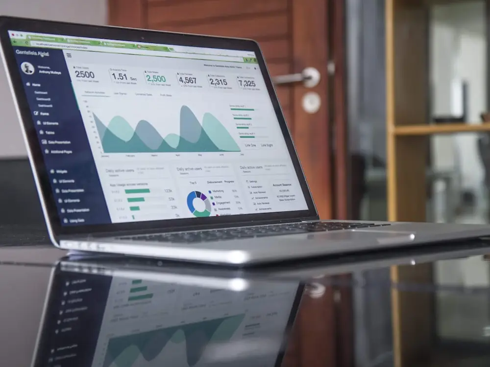 Income and occupancy report on a laptop